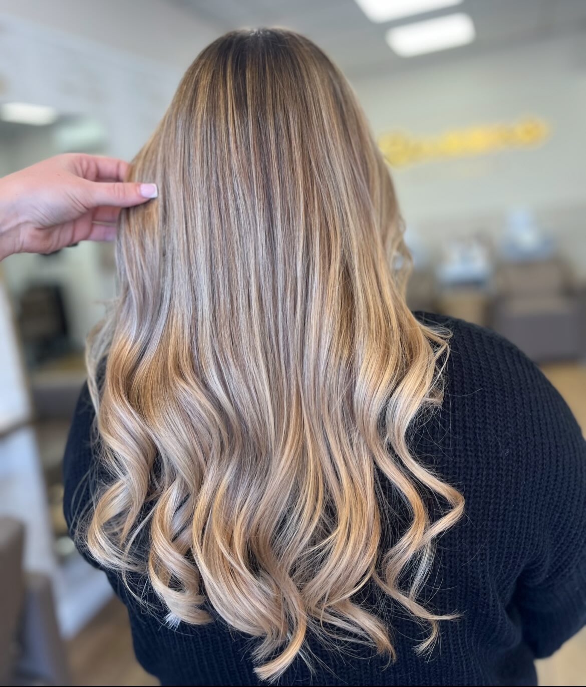 Long blonde hair by Queens Hair & Beauty